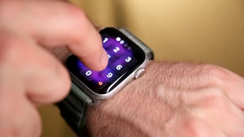Entering Security Passcode on Smartwatch Close Up Stock Footage 329103698