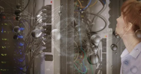 Entering server room, IT engineer inspecting cables; spheres drifting showing Stock Footage 317185441
