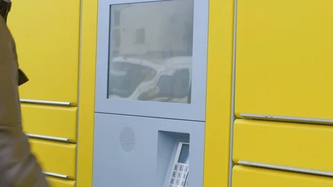 Entering something on a touch pad of a parcel station Video stock 97406411