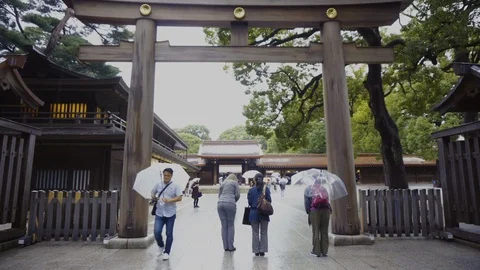 Entering Through Gate To Meiji Jingu Shrine Stock Footage 104285302