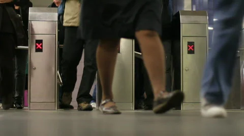 Entering through turnstile 2 Stock Footage 742393