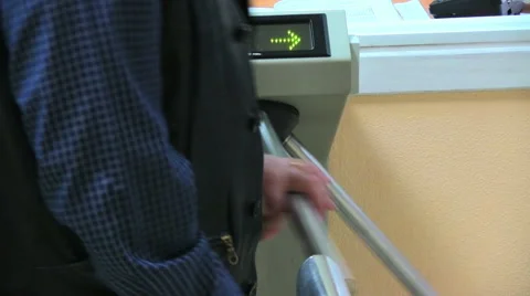 Entering through turnstile Stock Footage 39963809