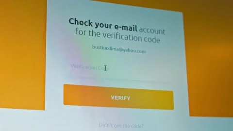 Entering verification code for crypto currency trade website account Stock Footage 150070434