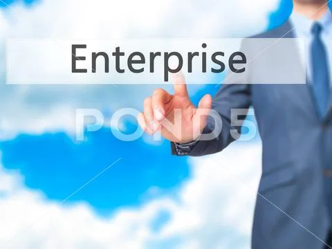 Enterprise - Businessman hand pressing button on touch screen in Stock Photos