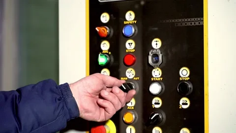 Enterprise. Close up of worker's hands pressing buttons on control panel Video stock 196106503