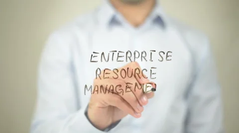 Enterprise Resource Management   ,  man writing on transparent wall Stock Footage 62634330