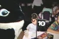 Entertainer in whale suit posing with children Footage