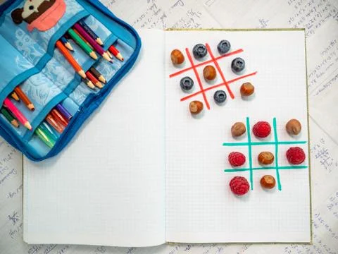 Entertaining learning with fun while playing tasty logical games. Stock Photos