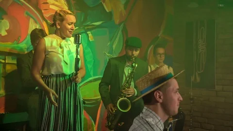 Entertaining the people in a bar with some nice music Stock Footage 112194425