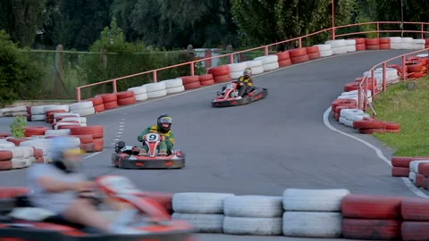 Entertainment complex customers operating go-carts, speed challenge, leisure 스톡 동영상 88261195