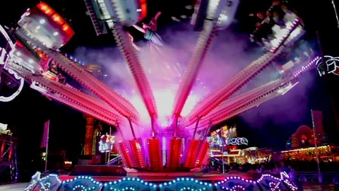 Entertainment rides at night fair. Stock Footage 108741825
