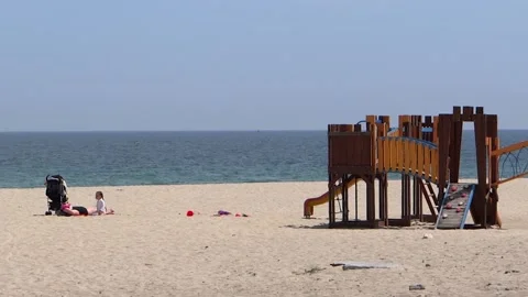 Entertainment Shells For Children On Beach Stock Footage 130182577