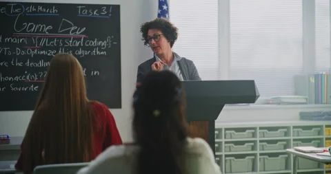 Enthusiastic American Teacher Explains Concept Students During Interactive Stock Footage 321019276