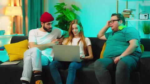 Enthusiastic and good looking group of friends two guys and one pretty lady on Stock Footage 146470163