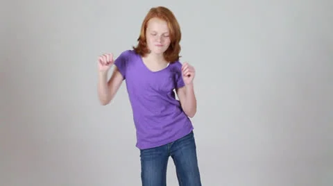 An enthusiastic dancing of a girl Stock Footage 22732753