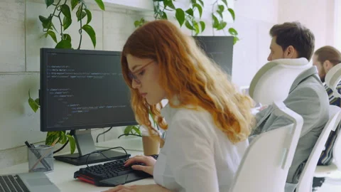 Enthusiastic Female Caucasian IT Programmer Working on Desktop Computer. Lady Stock Footage 258582532