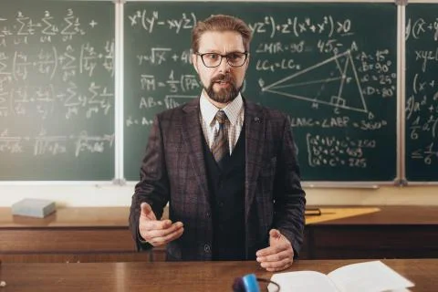 A Enthusiastic Professor Explaining A New Material Stock Photos