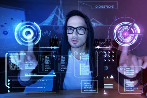 Enthusiastic programmer touching the transparent screen Stock-Fotos