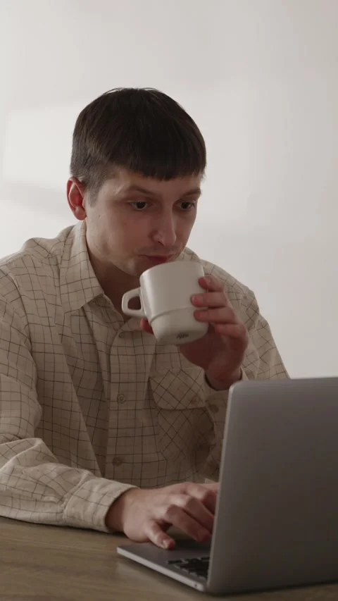 Enthusiastic young man typing on laptop keyboard fast at desk close up Stock Footage 335082378