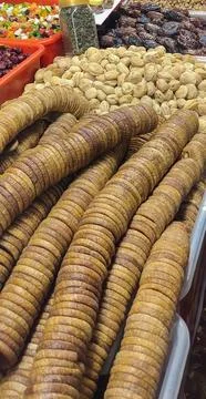 An enticing array of dried fruits and nuts at a market, Stock Photos
