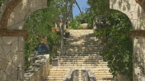 The entrance and stairs of the Mexican cemetery at Xcaret Park Stock Footage