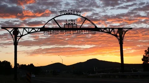 Entrance arch to Williams, AZ along historic Route 66 at sunset Stock Footage 66238484