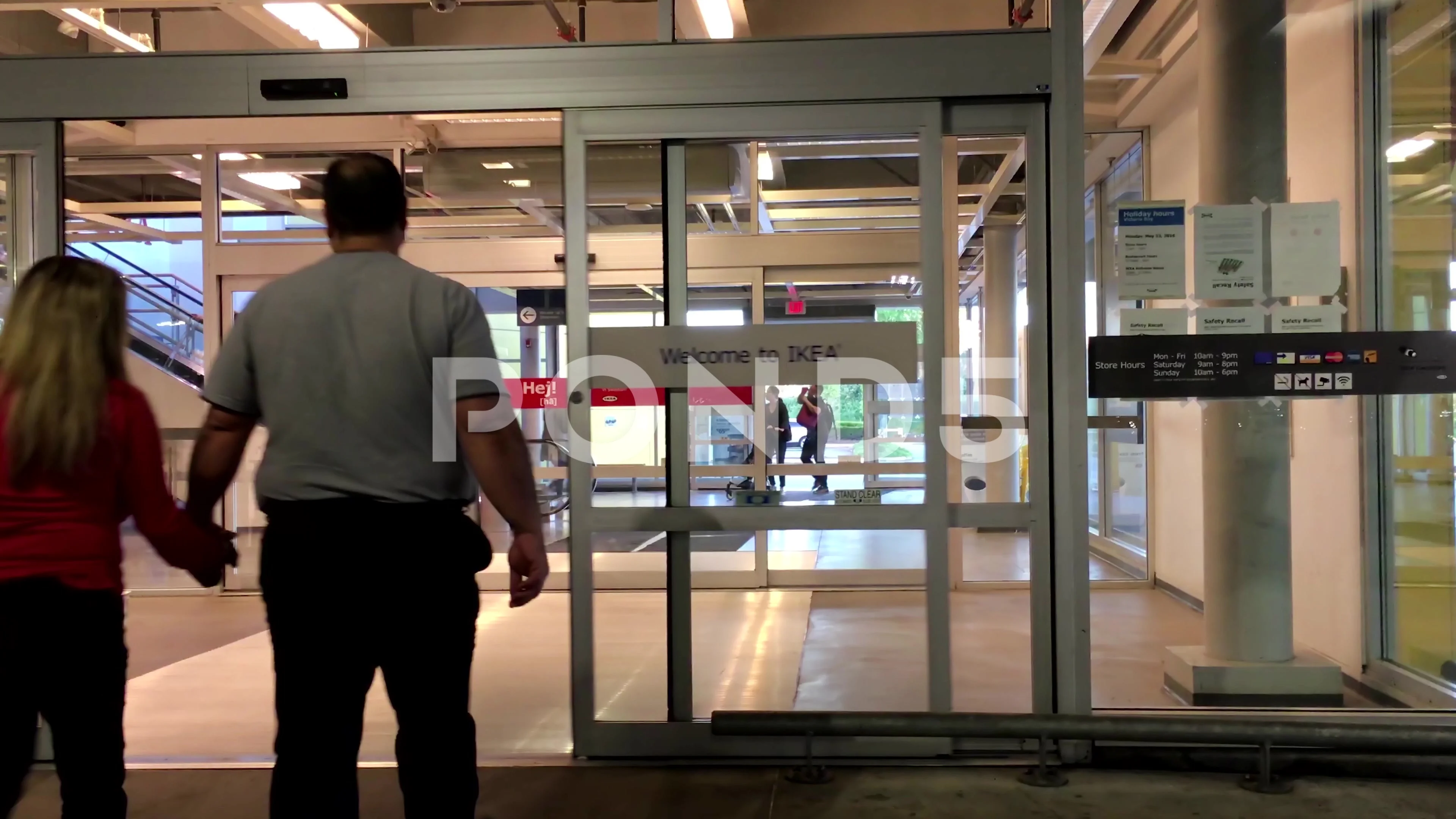 Entrance automatic glass door inside Ikea store