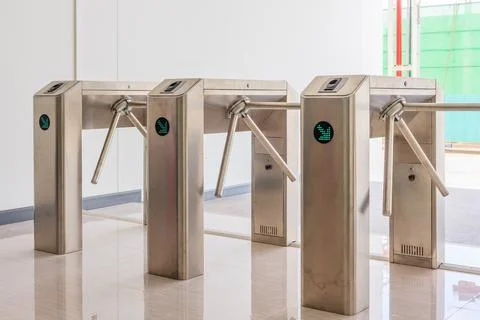 Entrance Gate Access Touch technology security system in a office building Stock Photos