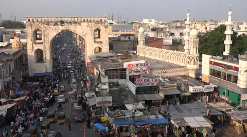 Entrance gate to Hyderabad city, Charminar area, call for prayer, Islam, India Stock Footage