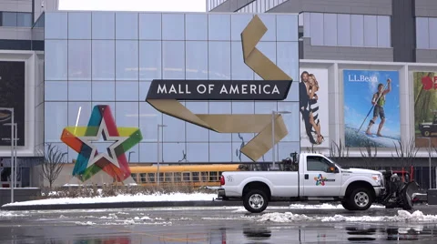 Entrance to the Mall of America with snow plows cleaning parking lot 4k Stock Footage 59221306