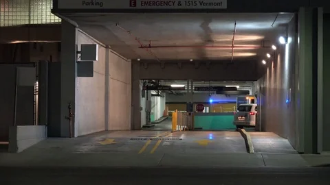 Entrance ot a parking garage at night, 4k Stock Footage