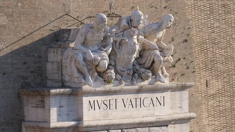 Entrance of vatican museums, sculture with Vatican seal. Rome, April 20, 2017 Stock Footage