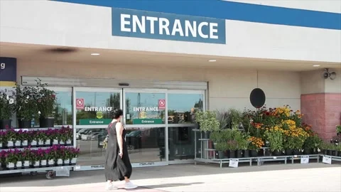 Entrance writing caption text facade sign word in white on blue outside exterior Stock Footage 250274466