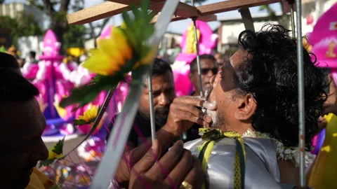 An Entranced Devotee Has Her Cheeks Skewered At Thaipusam Stock Footage 234038758