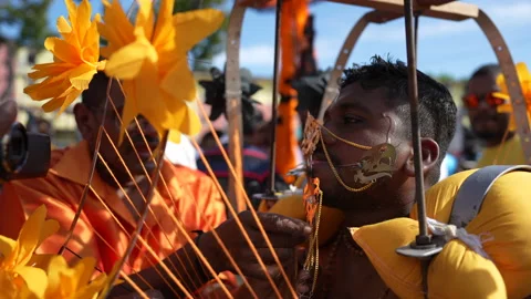 An Entranced Devotee Has His Cheeks And Tongue Skewered At Thaipusam Festival Stock Footage 234037363