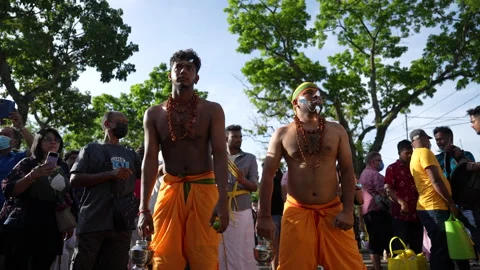Entranced Devotee With Hooks Piercing His Back Being Led Through Drummers Stock Footage 234038757