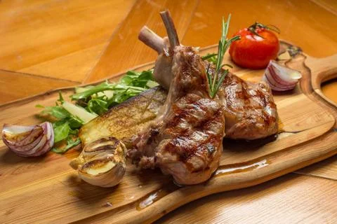 Entrecote meal on wooden desk Stock Photos