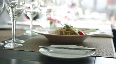 Entree on restaurant table Stock Footage 63297612