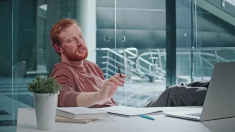 Entrepreneur in Doubt. Man Stares at Computer Deep in Thought at Office Stock Footage 311545537