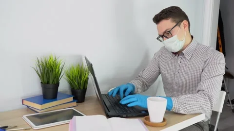 Entrepreneur using laptop, typing notes stay at home during quarantine covid-19 Stock Footage 131471429