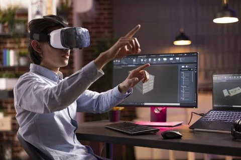 Entrepreneur Using VR Headset and CAD Software to modify prototypes Stock Photos