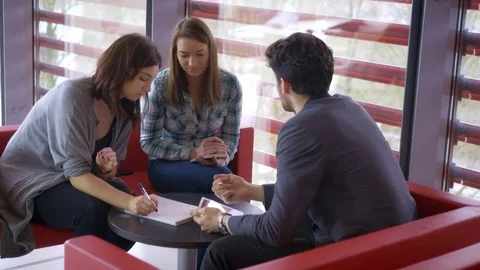 Entrepreneurs cooperating and thinking about the ideas for innovations Stock Footage 75553946