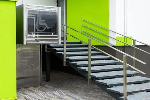Entry to block of flats building with elevator for physically challenged people Stock Photos