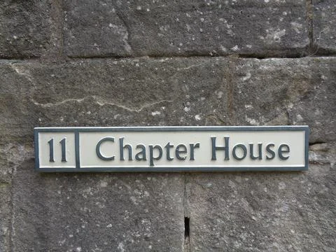 The entry to the chapter house by the tour through England Stock Photos