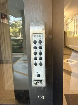 Entry Door Keypad with Access Code Panel and Bell Button Stock Photos