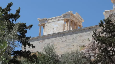 Entry gate of the famous Acropolis in Athens, from a distance and a low angle. Stock Footage 200548834