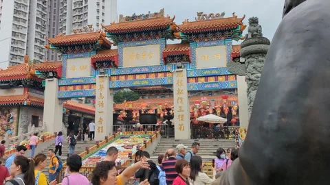 Entry gate to Sik Sik Yuen Wong Tai Sin Temple Hong Kong Stock Footage 271190631