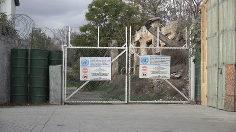 Entry gate United Nations buffer zone Nicosia, politics conflict Cyprus Stock Footage 229942185