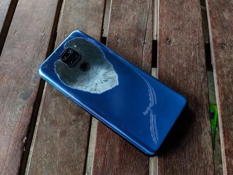 Entry Level Xiaomi Redmi Note 9 Casing Smartphone Casing is peeled off Stock Photos