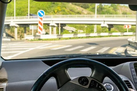 Entry to a multi-level road junction located outside the city, selective focu Stock Photos